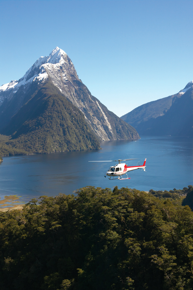 Flying through Milford Sound on an exclusive New Zealand helicopter flight in Fiordland National Park