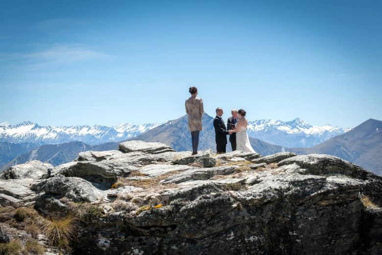 Frank and Aileen exchanging vows, high in the New Zealand mountains