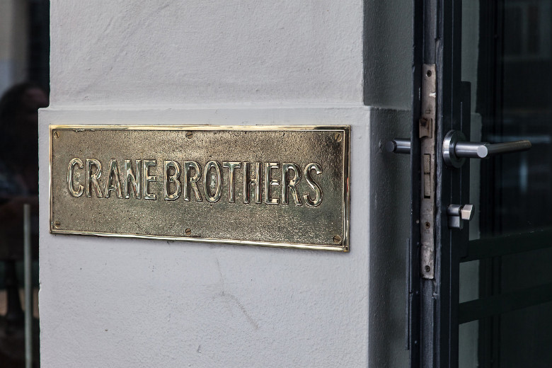 Crane Brothers brass plaque