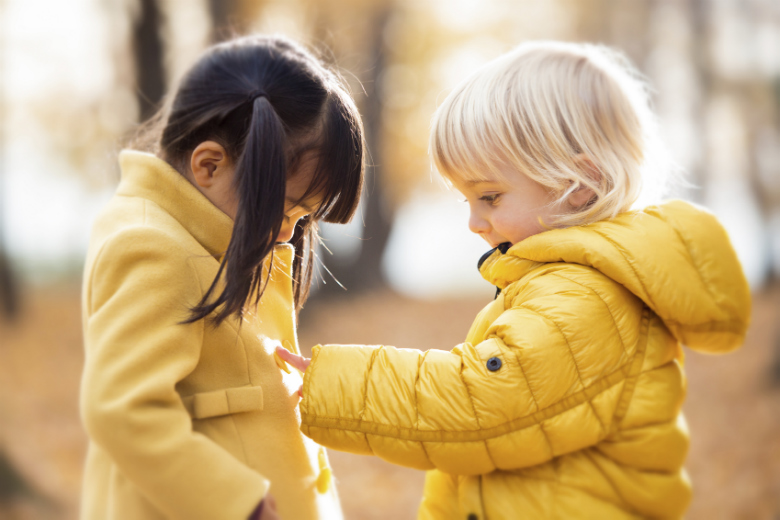 Children in yellow coats