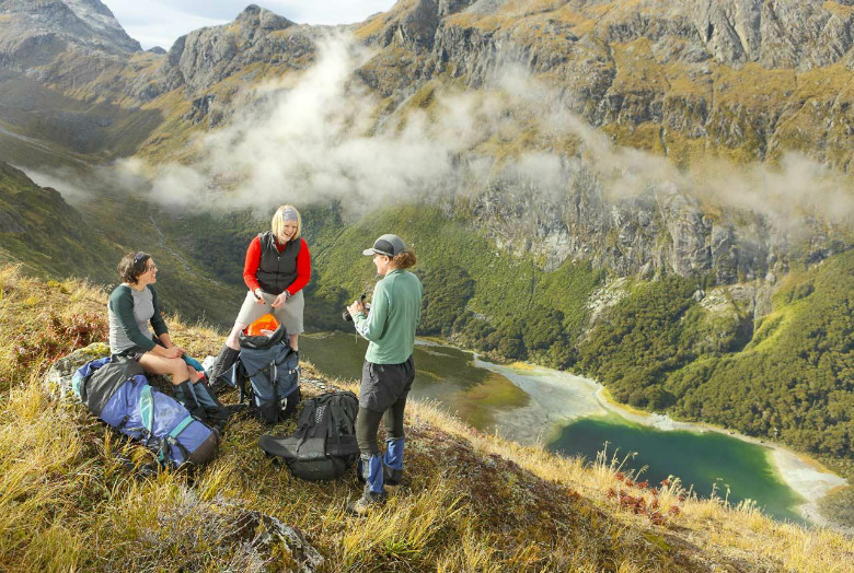 Hikers enjoying the view on the Routeburn Track