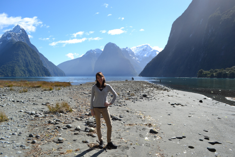 Carole standing near Sandfly Point in Milford Sound