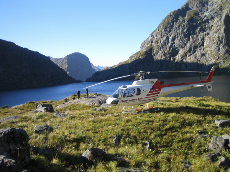 Arriving by helicopter at the spectacular Lake Quill with the Sutherland falls in the background.