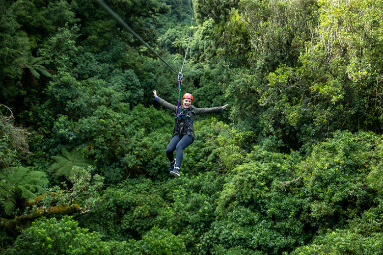 Zip lining high above the Rotorua Canopy 